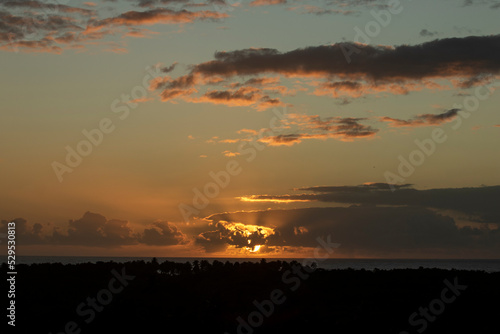 Porto de Pedras, Alagoas, Brazil. 08,15,2022. Sunrise is seen from the viewpoint of Tatuamunha beach, in Alagoas, northeast of Brazil. photo