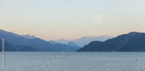 Harrison Lake during Sunny Summer Morning Sunrise. Canadian Nature Landscape Background. Harrison Hot Springs  British Columbia  Canada.