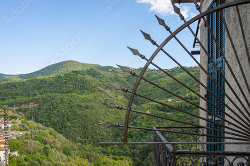 Green mountains panorama taken from the village of Apricale (Imperia Province, Liguria Region, Northern Italy). Old medieval town, is located above the Maritime Alps, near the Italy-French borders. photo