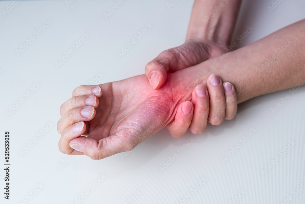 Woman with wrist pain, broken wrist, sprained wrist Stock Photo Adobe