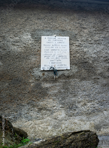 commemorative plaque of the italian partisan fighters, who died during the italian civil war 1943-45 due to the nazi-fascist roundups.
