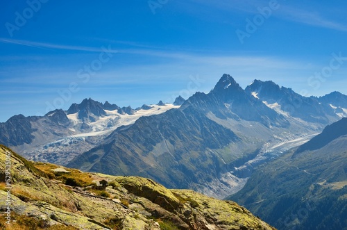 View of the Mont Blanc massif. Beautiful mountains in the French Alps above Chamonix. Glacier holidays, wanderlust. High quality photo © SimonMichael