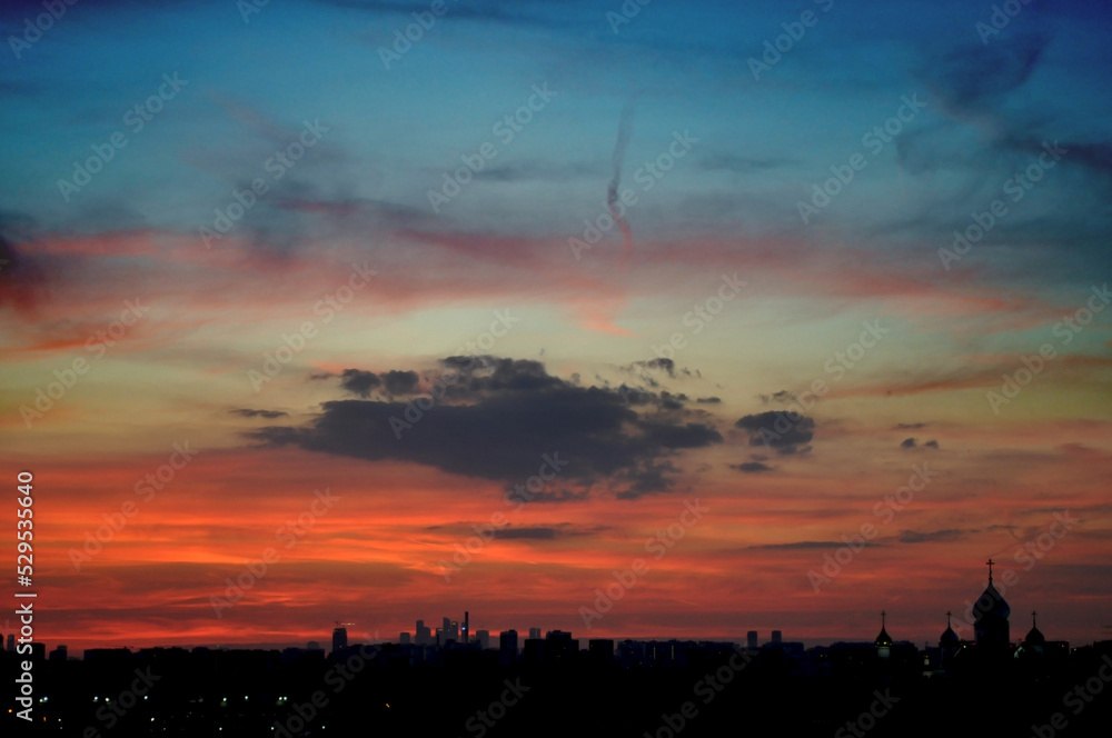 beautiful sunset sky over the city horizon