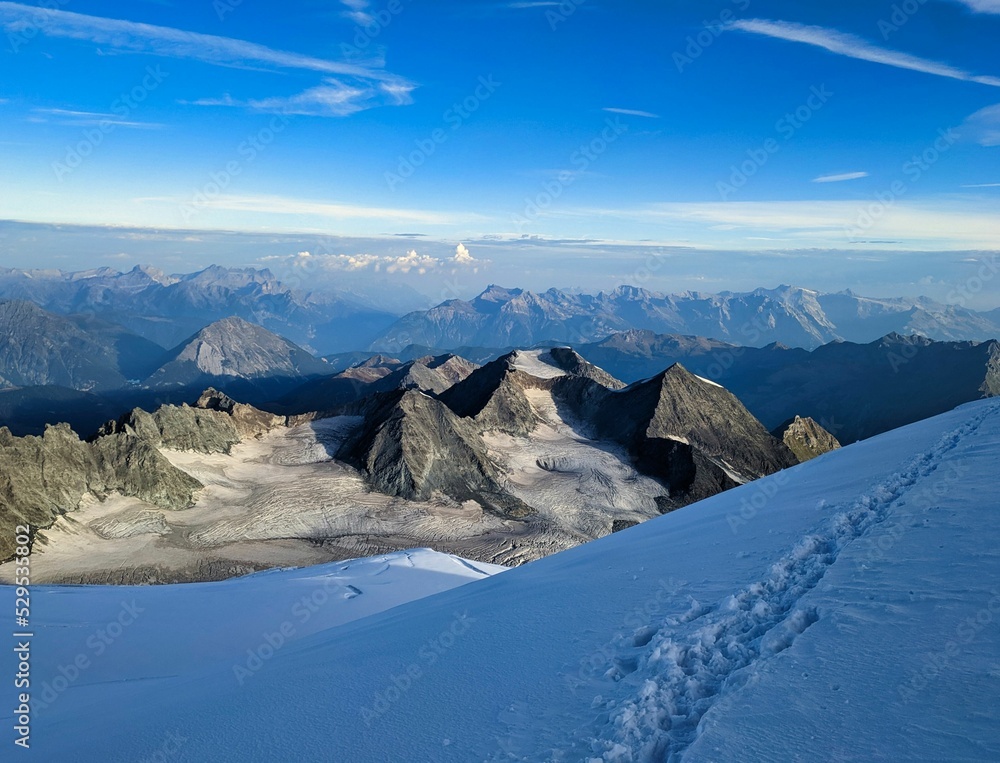 Mountaineering on the Grand Combin. Wonderful view at the top with many glaciers and mountains. High-altitude tour in the european alps. Valais Switzerland. High quality photo