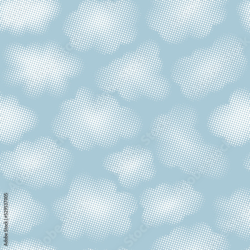 Blue sky with halftone clouds. Seamless pattern with dotted gradient clouds. Repeat background fluffy halftone cloudscape