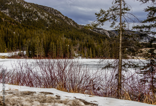 Pond is still frozen, Grotto Pond Provincial Recreation Area, Alberta, Canada