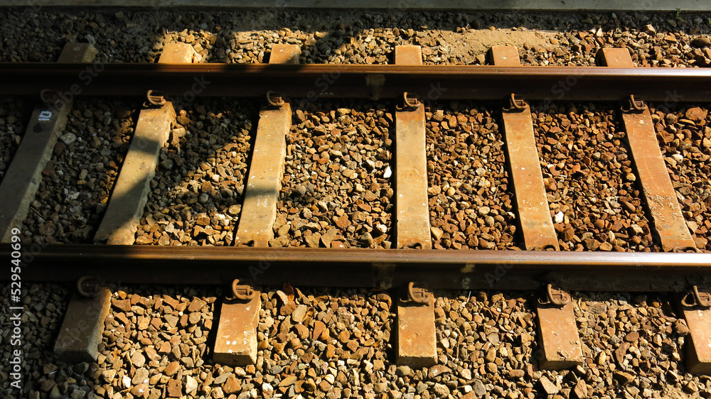 metal railroads lines, rail and crushed stone. railway track. train track. metal railroads lines, rail and crushed stone. railway track. train track.