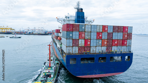 stern of Cargo container Ship in the ocean sea concept logistic transportation export to customs forwarding logistics service. Container on Bulk ship