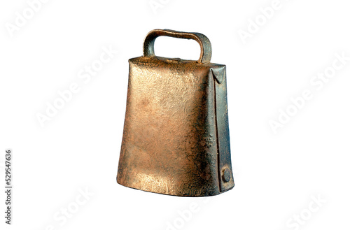 Rusty antique metal cowbell isolated on a white background photo