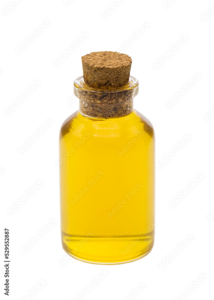 Yellow food coloring in mini glass bottle with cork isolated on white background Yellow food coloring in mini glass bottle with cork isolated on white background