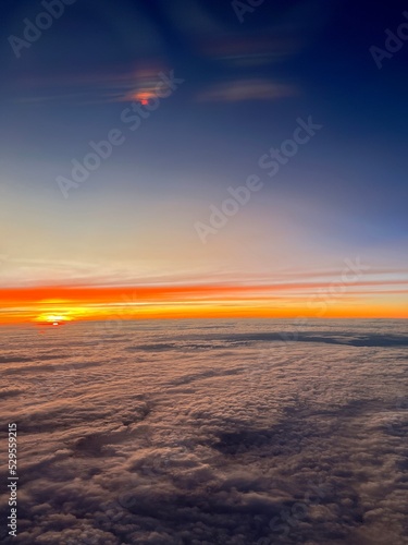 sunset over the clouds © Marcos