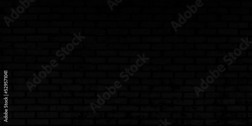 Old black brick wall texture background,brick wall texture for for interior or exterior design backdrop,vintage dark tone.