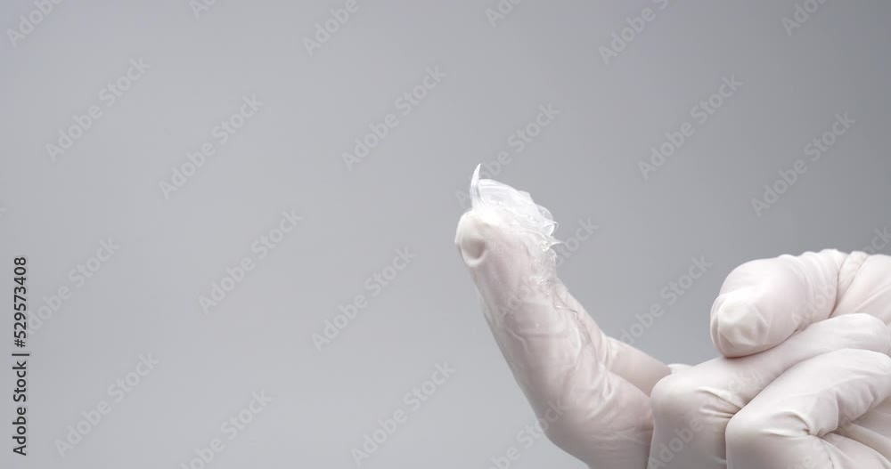 urologist appointment concept, lubricant on the fingers of a doctor in gloves,massage prostate High quality 4k footage urologist appointment concept, lubricant on the fingers of a doctor in gloves,massage prostate High quality 4k footage