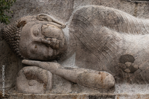 Φωτογραφία A reclining Buddha represents Buddha lying down, represents the historical Buddh