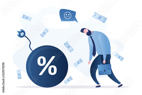 Sad businessman investor looking on exploding percentage bomb. Inflation or interest rate causing economic recession, tax or loan payment trouble, stock market crisis concept.