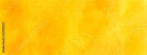 Abstract watercolor painted grainy orange background, Elegant yellow-orange abstract warm sunny bright saturated orange texture, empty smooth orange paper texture, rough and pale painted grunge.