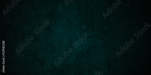 Texture of Elegant dark emerald blue and black wall stone marble smooth plaster texture grunge backdrop background. panorama with black shadow backdrop border and old vintage grunge texture design.