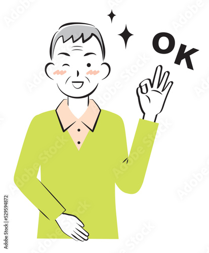 OKサインを出す私服の高齢の男性　3c