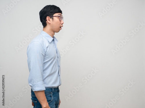 Side view of young businessman looking at copy space