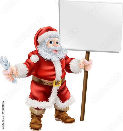 Santa holding spanner and sign
