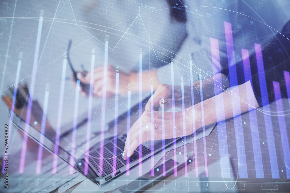 Multi exposure of woman hands typing on computer and financial chart hologram drawing. Stock market analysis concept.