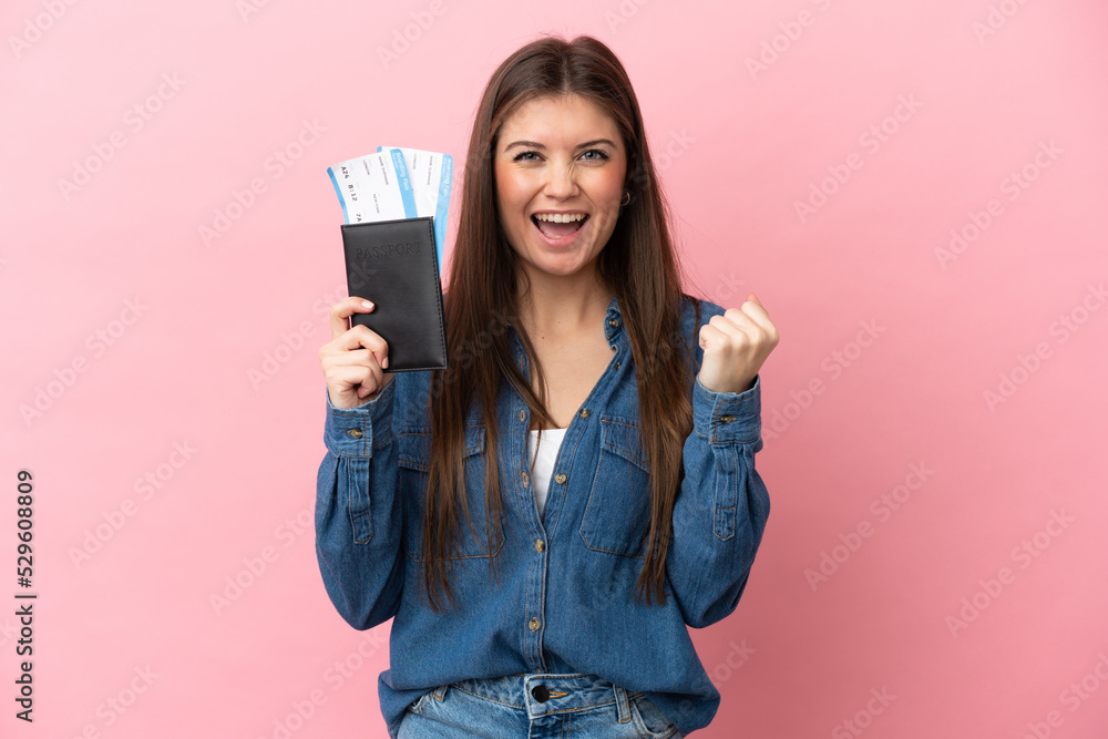Young caucasian woman isolated on pink background happy in vacation with passport and plane tickets Young caucasian woman isolated on pink background happy in vacation with passport and plane tickets