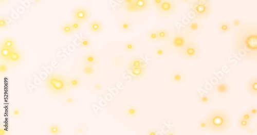 Abstract background of glowing shiny moving blurry bokeh particles, sparkles on black background. Blurred defocused Christmas pattern with sparkles.