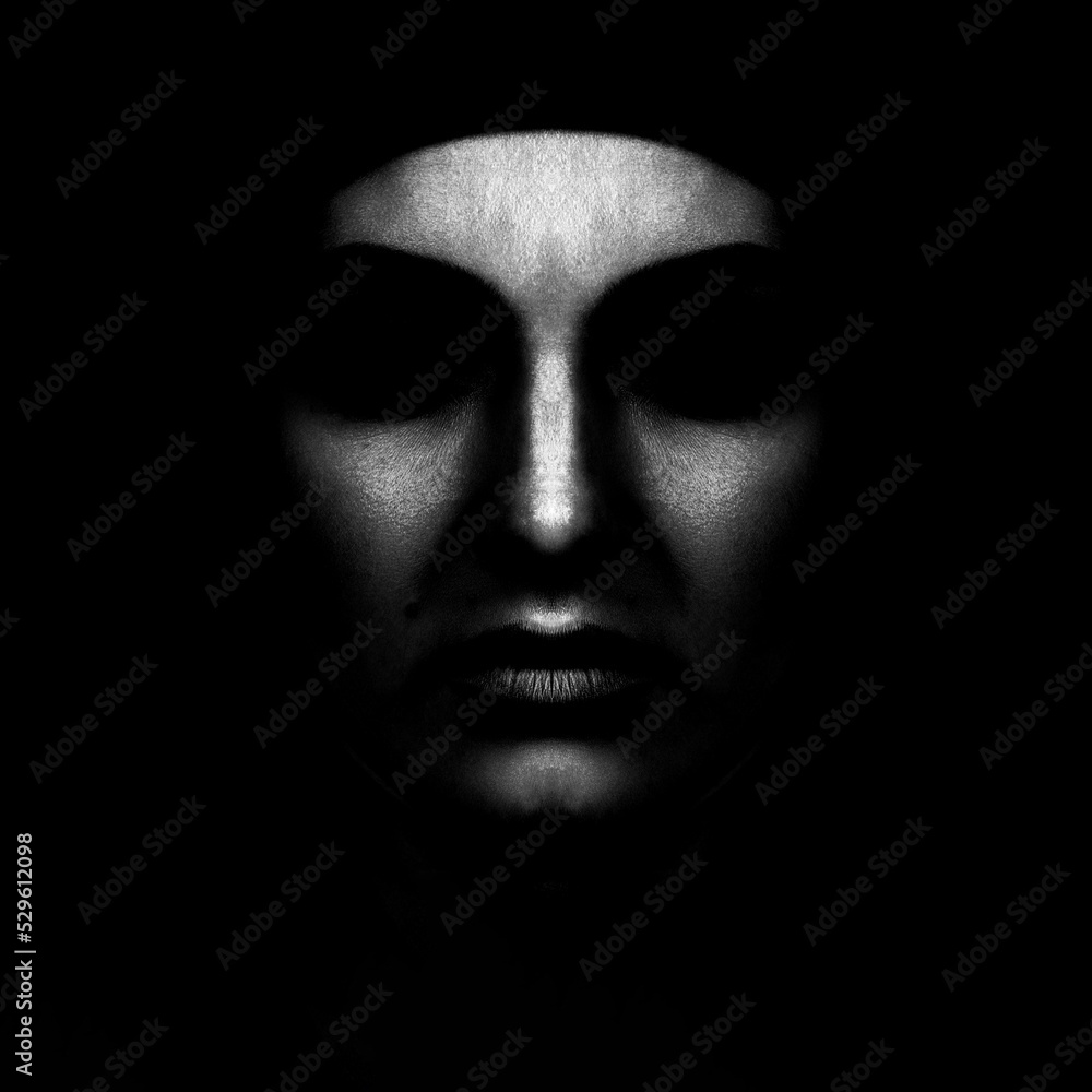 Beauty and fashion concept. Abstract woman face silhouette hiding in shadow. Black and white image. Horror, sci-fi and futuristic looking style. Abstract studio portrait with copy space Beauty and fashion concept. Abstract woman face silhouette hiding in shadow. Black and white image. Horror, sci-fi and futuristic looking style. Abstract studio portrait with copy space