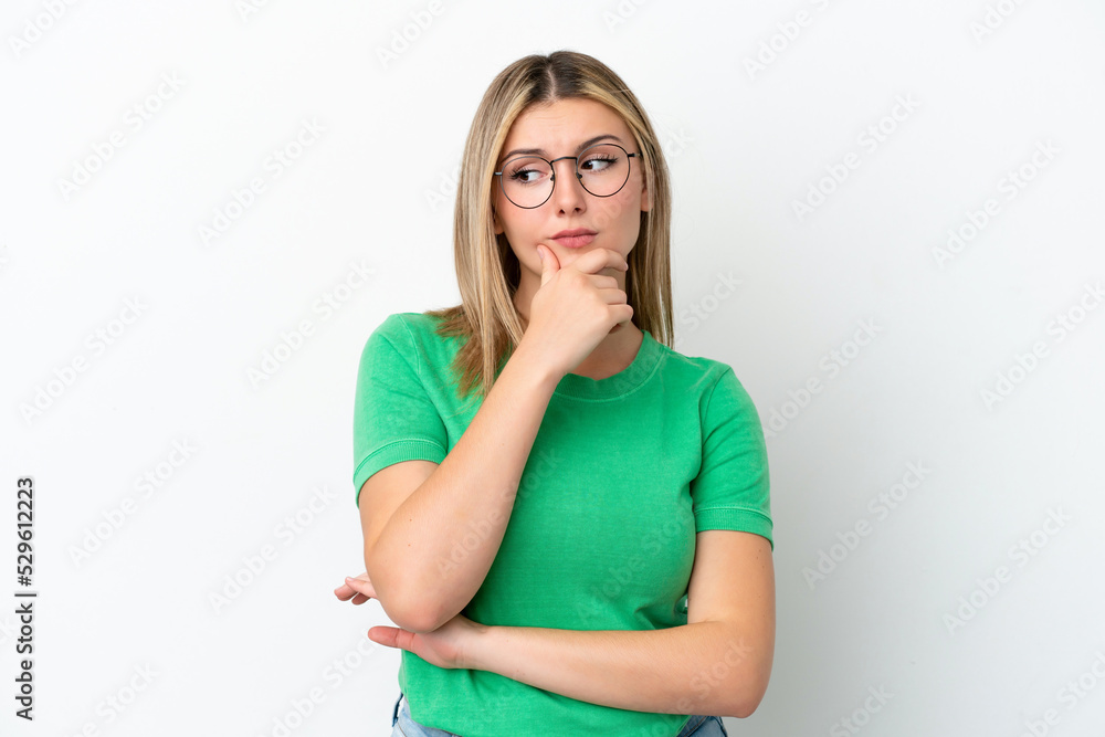 Young caucasian woman isolated on white background having doubts Young caucasian woman isolated on white background having doubts