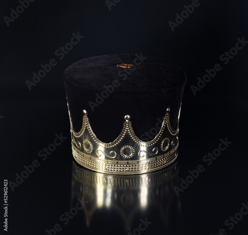king crown isolated on black background