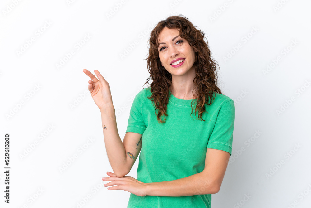 Young woman with curly hair isolated on white background happy and pointing up Young woman with curly hair isolated on white background happy and pointing up