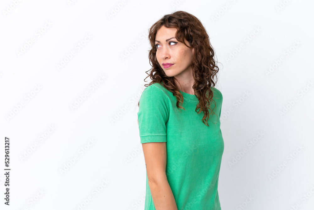 Young woman with curly hair isolated on white background . Portrait Young woman with curly hair isolated on white background . Portrait