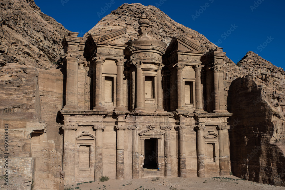 Highlight of Petra, the amazing Ad Deir, The Monastery with blue sky
