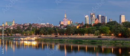 Warsaw. View of the city and city embankment at sunset.