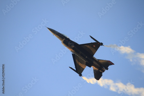 f 16 fighter jet in Turkish Air Force aerobatic demonstration team which called Turkish Stars are flying on the sky for 9 September- Izmir Independence Day