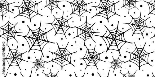 Vector seamless pattern of black hand drawn spider web and dots on white background. Cute Halloween pattern with cobweb. Halloween design for packing paper or cover.