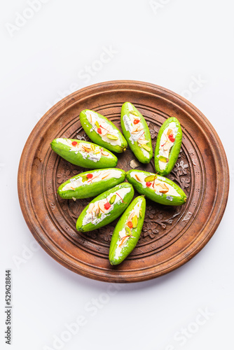 Parwal Mithai is a popular North Indian sweet called Parval Pak, made using pointed gourd and khoya photo