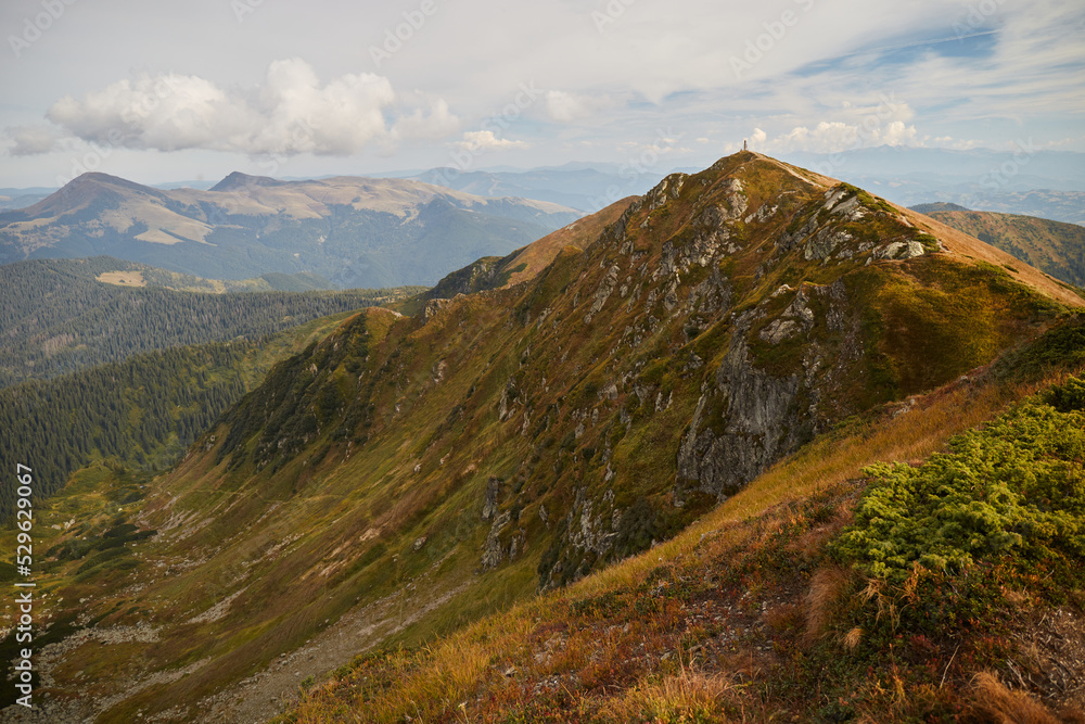 Mountain trail in Carpathian Mountains, Ukraine. Walking and hiking trails in Marmaros ridge. Rural area of carpathian mountains in autumn