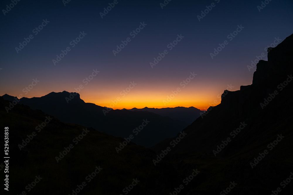 Beautiful sunset on the mountain. Sefinenfurgge Pass with a fantastic view of the swiss alps. Beautiful evening mood. Trekking concept