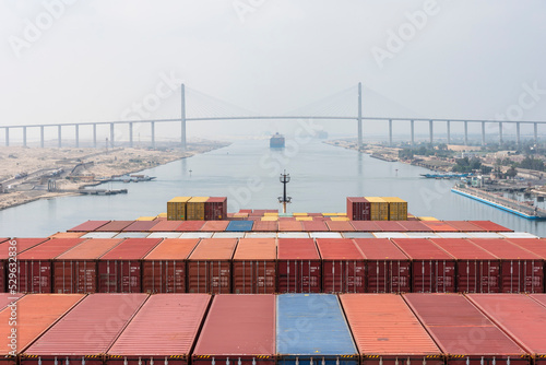 Konstfotografi View on the top of the containers loaded on deck of the large cargo ship