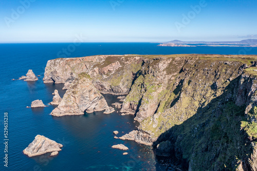Aerial view of the cliffs near the lighthouse on the island of Arranmore in County Donegal, Ireland
