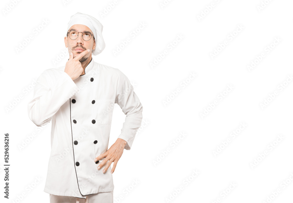 Amazed young chef looking gesture Amazed young chef looking gesture