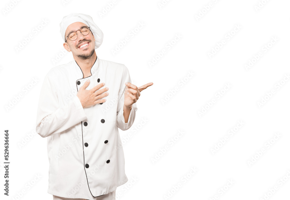 Naughty young chef laughing at you Naughty young chef laughing at you