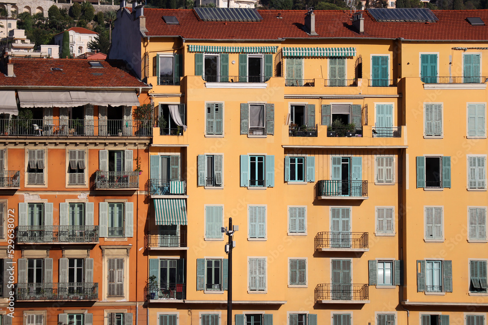 Nice, France - 09.09.2022 : Close-up of colorful facades in the port of Nice
