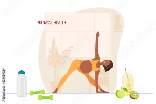 Prenatal yoga. Pregnant African American woman doing yoga in home interior. Woman in sportswear makes Triangle Pose. Women healthy life style concept. Healthy food, drinking regimen, sports