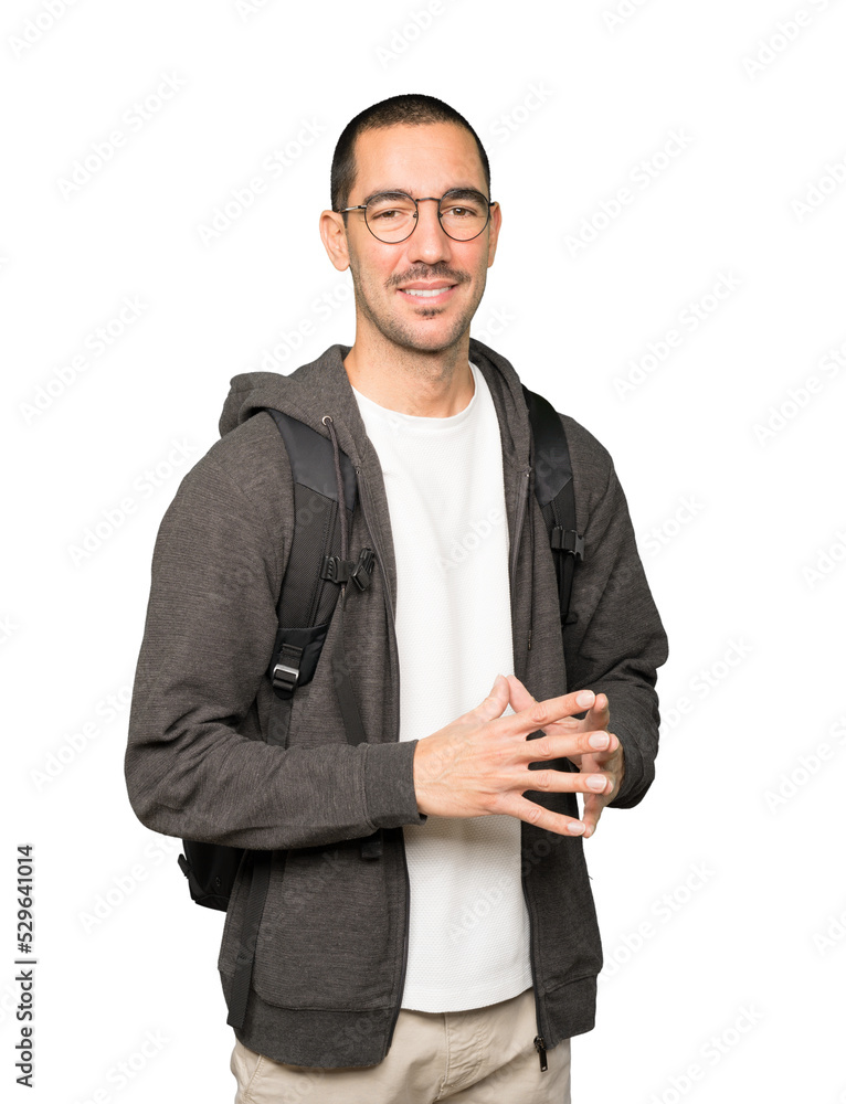 Friendly student doing a gesture of confidence Friendly student doing a gesture of confidence