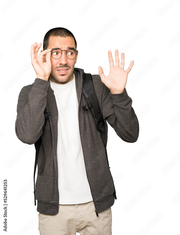 Scared student screaming against background Scared student screaming against background