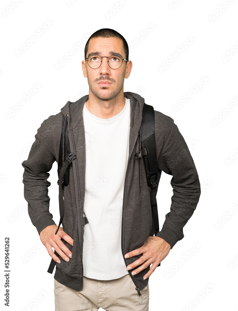 Serious student looking against background Serious student looking against background