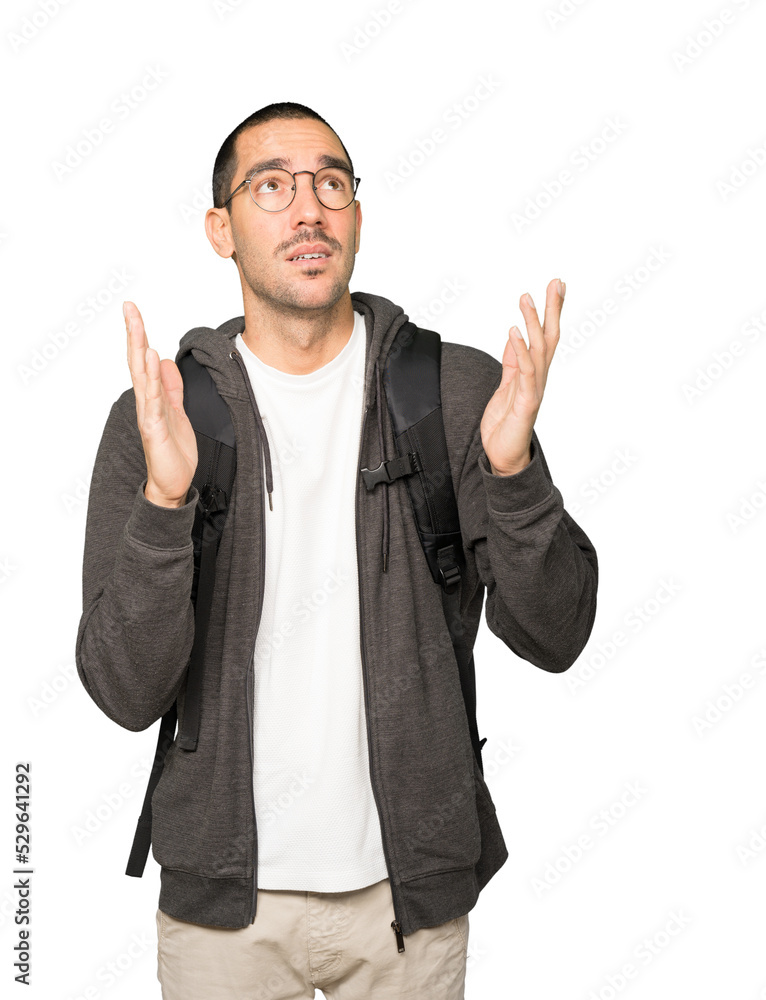 Happy student looking up gesture Happy student looking up gesture