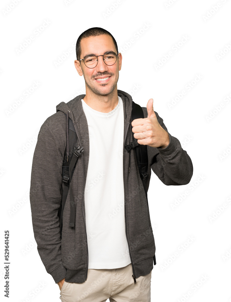 Happy student gesturing that everything is fine Happy student gesturing that everything is fine